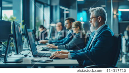 Group of People Working on Computers 114317710