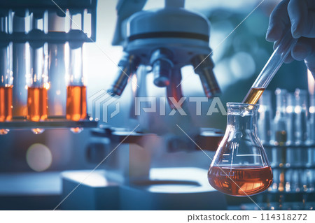 Drop the liquid into the container. Empty glass pedestal with geometric glass base. Test tubes in science laboratory chemistry laboratory equipment Research and develop cosmetics in the laboratory Sto 114318272