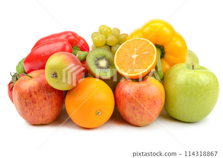 Fruits and vegetables in a wicker basket isolated on a white . Fruits and vegetables in a wicker basket isolated on a white . 114318867