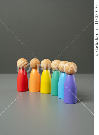 Figures of people lined up in the colors of the LGBT flag. Lesbian, gay, bisexual, and transgender. International Pride Day. Protection of the rights and freedoms of sexual minorities. Figures of people lined up in the colors of the LGBT flag. Lesbian, gay, bisexual, and transgender. International Pride Day. Protection of the rights and freedoms of sexual minorities. 114320172