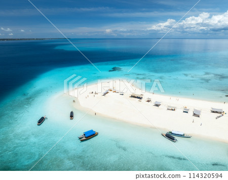 Aerial view of island, sandbank in blue sea, white sand, boats Aerial view of island, sandbank in blue sea, white sand, boats 114320594