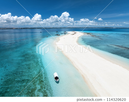 Aerial view of island, sandbank in ocean, sandy beach, boat 114320620