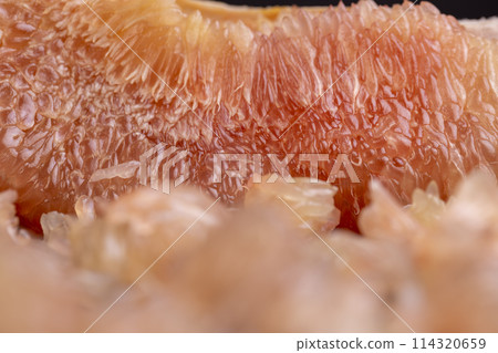 peeled red and pink pomelo on the table peeled red and pink pomelo on the table 114320659