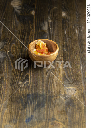 dried papaya fruits on the table dried papaya fruits on the table 114320668