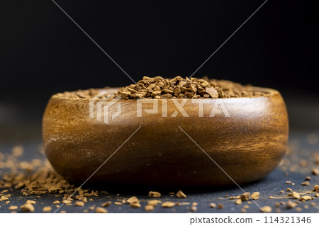 brown pieces of instant coffee for making a coffee drink 114321346