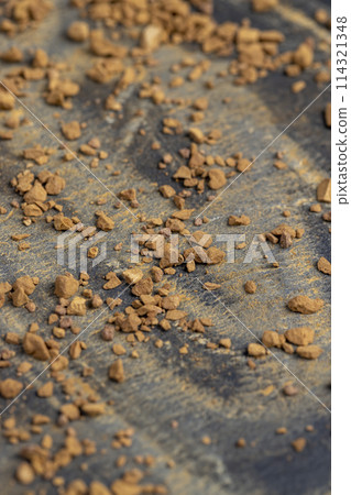 brown pieces of instant coffee for making a coffee drink 114321348