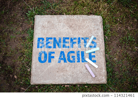 BENEFITS OF AGILE. Colored pieces of chalk on a concrete pavement slab BENEFITS OF AGILE. Colored pieces of chalk on a concrete pavement slab 114321461