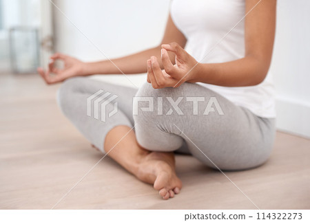 Woman hands, meditation and spiritual in a home with mockup space and chakra for balance and mindfulness. Morning, wellness and zen in house on floor to relax for calm and peace in lotus position Woman hands, meditation and spiritual in a home with mockup space and chakra for balance and mindfulness. Morning, wellness and zen in house on floor to relax for calm and peace in lotus position 114322273