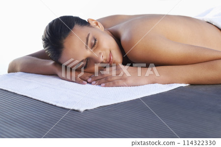 Spa, sleeping or face of woman ready for luxury treatment, facial skincare or beauty for wellness. Towel, healing therapy or zen female client on bed to start massage, detox or chemical peel to relax 114322330