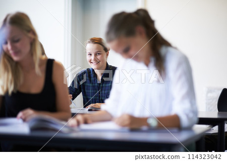 College student, portrait and learning with notes in class, lecture or people in education. University, classroom and face of happy woman with notebook, knowledge and studying in academy or school 114323042