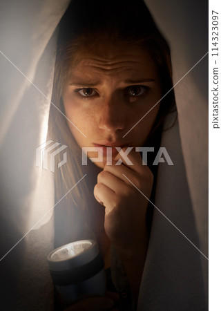 Woman, flashlight and portrait with blanket for mental health, horror or anxiety. Young person and scared or sad with depression, ocd or horror for financial crisis, stress and disappointment Woman, flashlight and portrait with blanket for mental health, horror or anxiety. Young person and scared or sad with depression, ocd or horror for financial crisis, stress and disappointment 114323097
