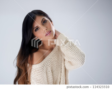 Woman, fashion and hair, portrait and makeup in studio for winter style salon with treatment and wellness on white background. Cosmetics, trendy jersey or sweater with haircare, volume and growth Woman, fashion and hair, portrait and makeup in studio for winter style salon with treatment and wellness on white background. Cosmetics, trendy jersey or sweater with haircare, volume and growth 114323310