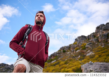 Man, hiking and mountain with bag in nature, Germany trail for conservation. Active, male person on adventure for health and wellness, confident explorer on backpacking for outdoor sport or walk 114323332