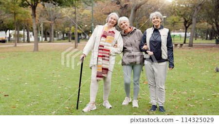 Smile, retirement and senior friends in the park, laughing together while standing on a field of grass. Portrait, freedom and comedy with a group of elderly women in a garden for fun or humor Smile, retirement and senior friends in the park, laughing together while standing on a field of grass. Portrait, freedom and comedy with a group of elderly women in a garden for fun or humor 114325029