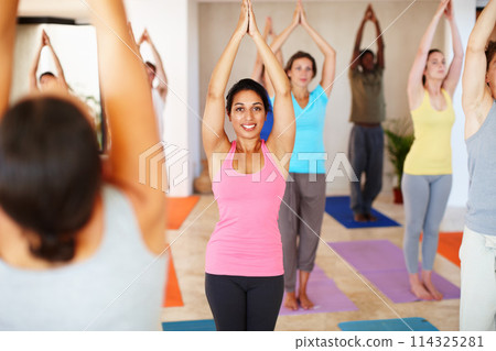 Fitness, yoga and happy people with personal trainer for class stretching, exercise and workout on mat. Pilates, health club and men and women with instructor for wellness, balance and healthy body Fitness, yoga and happy people with personal trainer for class stretching, exercise and workout on mat. Pilates, health club and men and women with instructor for wellness, balance and healthy body 114325281