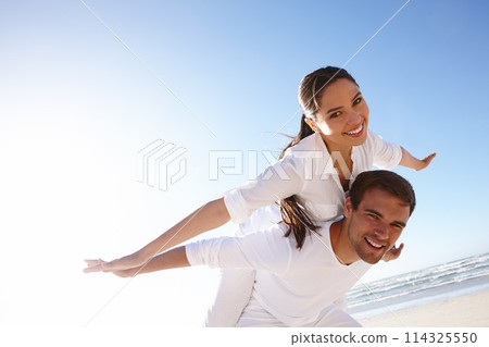 Airplane, piggyback or happy couple on a beach for portrait or love with support, loyalty or outdoor freedom. Sky mockup space, romantic man or woman on holiday vacation to relax for wellness or care 114325550