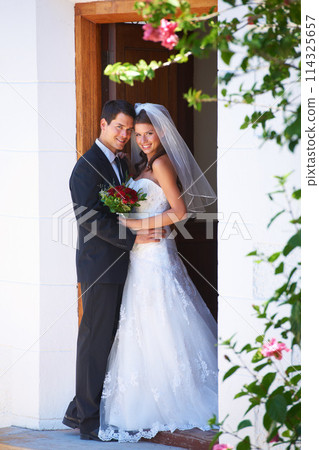 Happy couple, portrait and hug at wedding for marriage, love or honeymoon in commitment together. Married man or groom hugging woman or bride smile in embrace, loyalty or support in trust at ceremony 114325657