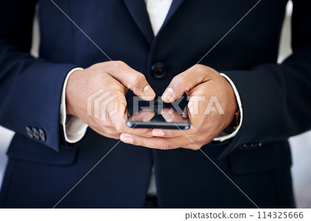 Businessman, hands and smartphone in office for typing, browsing and texting online with contact. Technology, connectivity and male person with cellphone for networking, social media or salesman 114325666