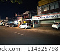 Car parks in urban areas are close to several industrial buildings 114325798