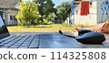 Doing work outside the home while relaxing 114325808