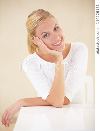 Portrait, happy woman and idea with smile in home for peace, calm or relaxing. Female person, hand and pose for joyful expression on face for daydream, vision or thinking for zen, comfort and alone 114326181