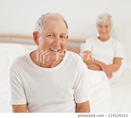Elderly man, couple and portrait in bed, smile and relaxing together in retirement at home. Senior people, bedroom and comfort in marriage or relationship, love and bonding for romance on weekend 114326351