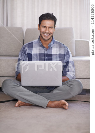 Man, internet and portrait for laptop on floor of living room, education and scroll or browse on website. Male person, student and online for info or home for app, sitting and elearning or study Man, internet and portrait for laptop on floor of living room, education and scroll or browse on website. Male person, student and online for info or home for app, sitting and elearning or study 114326806