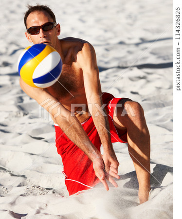 Beach sand, sports man and strike volley ball in game, competition or outdoor practice challenge, match or contest. Fitness workout, athlete action and player hit volleyball on nature cardio vacation 114326826