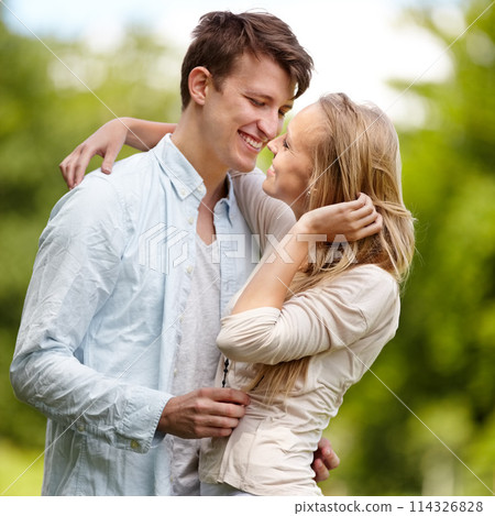 Park, happy and couple hug, love or bonding in outdoor nature, green garden or romantic countryside date. Freedom, wellness and summer husband, wife or people together for care, support or embrace 114326828