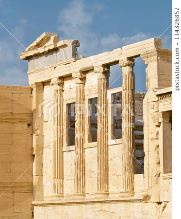 Greek history, ruin or ancient pillar with keystone arch, architectural detail for tourist attraction site. Background, outdoor or stone of temple building for culture in Acropolis, Greece in city Greek history, ruin or ancient pillar with keystone arch, architectural detail for tourist attraction site. Background, outdoor or stone of temple building for culture in Acropolis, Greece in city 114326852