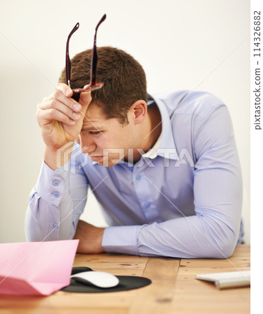 Stress, job loss and businessman at desk with fear of bankruptcy, debt and letter of unemployment. Anxiety, depression and burnout, business risk and frustrated man in office with termination notice Stress, job loss and businessman at desk with fear of bankruptcy, debt and letter of unemployment. Anxiety, depression and burnout, business risk and frustrated man in office with termination notice 114326882