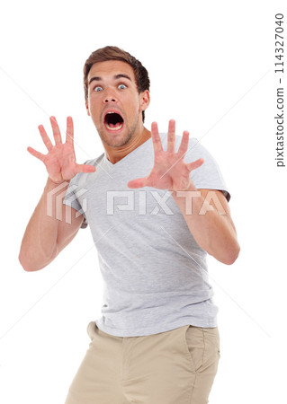 Shocked, scared and portrait of man on a white background for surprise, horror and fear reaction. Shouting, screaming and isolated person with hand gesture for terror, anxiety and afraid in studio Shocked, scared and portrait of man on a white background for surprise, horror and fear reaction. Shouting, screaming and isolated person with hand gesture for terror, anxiety and afraid in studio 114327040