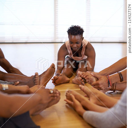 Stretching, feet and legs of people in class and on floor to start dance practice together in studio or academy. Training, body and healthy exercise for fitness in school with yoga or pilates workout 114327374