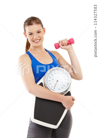 Portrait of woman, dumbbell and scale in studio for measurement, smile and excited for results of training. Female person, body and care for strength or muscle, weight loss and white background Portrait of woman, dumbbell and scale in studio for measurement, smile and excited for results of training. Female person, body and care for strength or muscle, weight loss and white background 114327583