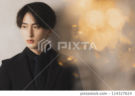 Man in black suit Man in black suit 114327624