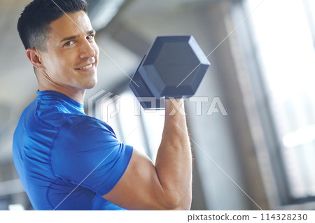 Portrait, bodybuilder or happy man with dumbbell in workout, training or exercise for grip power. Strong, bodybuilding or athlete with weights for gym pump, sports challenge or energy for fitness 114328230