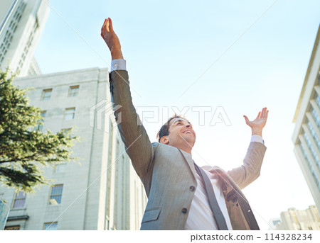 Business man, city and freedom or celebration for career success, winning and wow with arms up in sky. Low angle of a corporate worker or lawyer excited for opportunity, news and bonus or promotion 114328234
