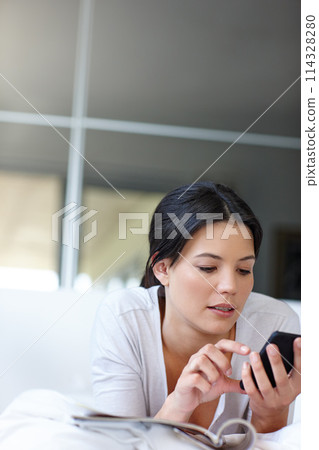 Woman, smartphone and check text in bedroom for social media, technology and internet communication. Female person, mobile phone and looking online in house for magazines, website and search Woman, smartphone and check text in bedroom for social media, technology and internet communication. Female person, mobile phone and looking online in house for magazines, website and search 114328280