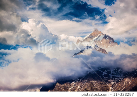 Snowcapped summit top of mountain in Himalayas 114328297