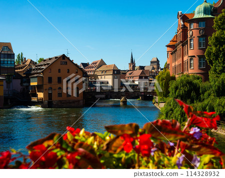 Charming view of buildings along canals of Strasbourg Charming view of buildings along canals of Strasbourg 114328932