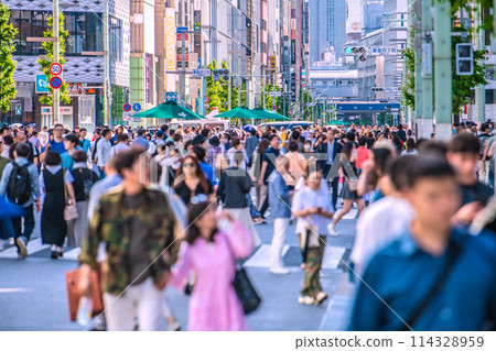 Tokyo cityscape in Japan: Ginza pedestrian precinct crowded with couples during Golden Week...inbound tourism revival = May 5th Tokyo cityscape in Japan: Ginza pedestrian precinct crowded with couples during Golden Week...inbound tourism revival = May 5th 114328959