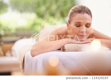 Woman, spa or relax as massage, therapy or luxury in self care, wellness and mental health. Salon, rest or glow on zen, beauty or bed as detox, balance or cosmetology at holistic retreat in Maldives Woman, spa or relax as massage, therapy or luxury in self care, wellness and mental health. Salon, rest or glow on zen, beauty or bed as detox, balance or cosmetology at holistic retreat in Maldives 114329197