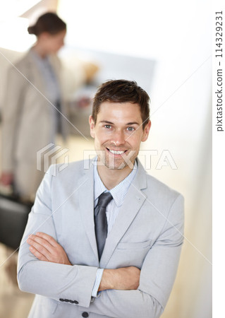 Businessman, corporate portrait and arms crossed in workplace with career confidence, startup pride and mockup space. Entrepreneur, employee and smile in company building for professional service Businessman, corporate portrait and arms crossed in workplace with career confidence, startup pride and mockup space. Entrepreneur, employee and smile in company building for professional service 114329231