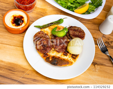 Grilled meatballs, kofte on plate Grilled meatballs, kofte on plate 114329232