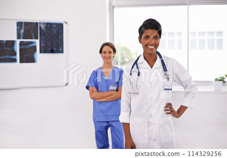 Portrait, leader and smile of medical team in hospital for healthcare, wellness and arms crossed. Happy doctor, nurse and collaboration of professional experts or confident women in radiology clinic Portrait, leader and smile of medical team in hospital for healthcare, wellness and arms crossed. Happy doctor, nurse and collaboration of professional experts or confident women in radiology clinic 114329256