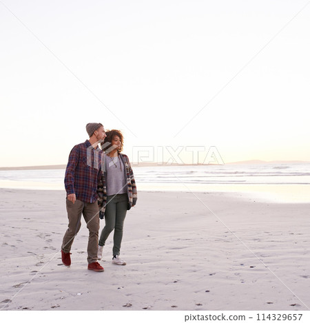 Couple, beach and walking together in nature, happy calm people on vacation. Ocean, outdoor and partners in love with respect and care, date and romantic stroll for relax with seaside sunrise Couple, beach and walking together in nature, happy calm people on vacation. Ocean, outdoor and partners in love with respect and care, date and romantic stroll for relax with seaside sunrise 114329657
