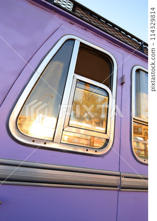 Closeup, train carriage and travel with transportation outdoor, holiday or trip at station with railway vehicle and window. Metro, railroad and subway for commute, adventure and journey with transit 114329814