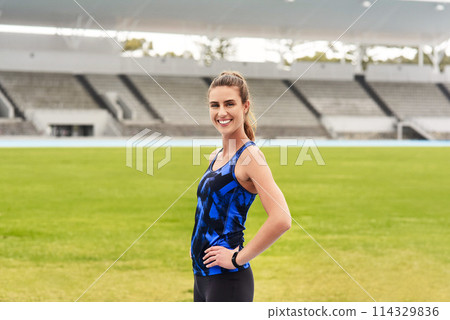 Girl, athlete and happy portrait in stadium for long distance running or sprinting for athletics and training. Female runner, confident and positive for track or field events for olympics in Paris. Girl, athlete and happy portrait in stadium for long distance running or sprinting for athletics and training. Female runner, confident and positive for track or field events for olympics in Paris. 114329836
