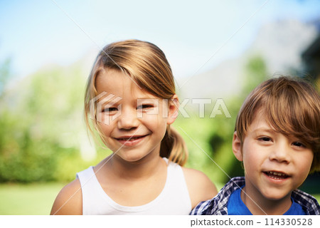 Portrait, smile and children outdoor at park for bonding, love and family together with girl in summer garden. Face, kids and happy siblings, brother and adorable young sister in nature with boy Portrait, smile and children outdoor at park for bonding, love and family together with girl in summer garden. Face, kids and happy siblings, brother and adorable young sister in nature with boy 114330528