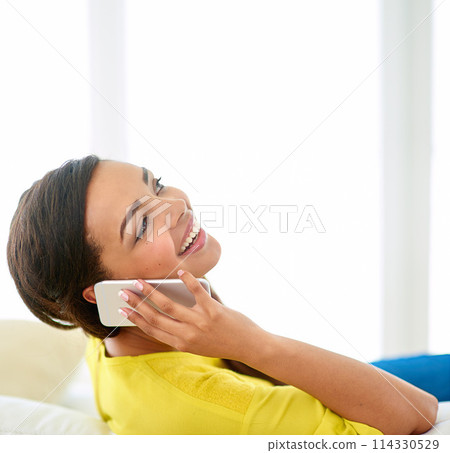 Woman, phonecall and laugh for audio conversation, funny joke and good news on sofa in lounge. Young person, happy and mobile phone for comic talk, chatting or speaking for discussion on mockup 114330529